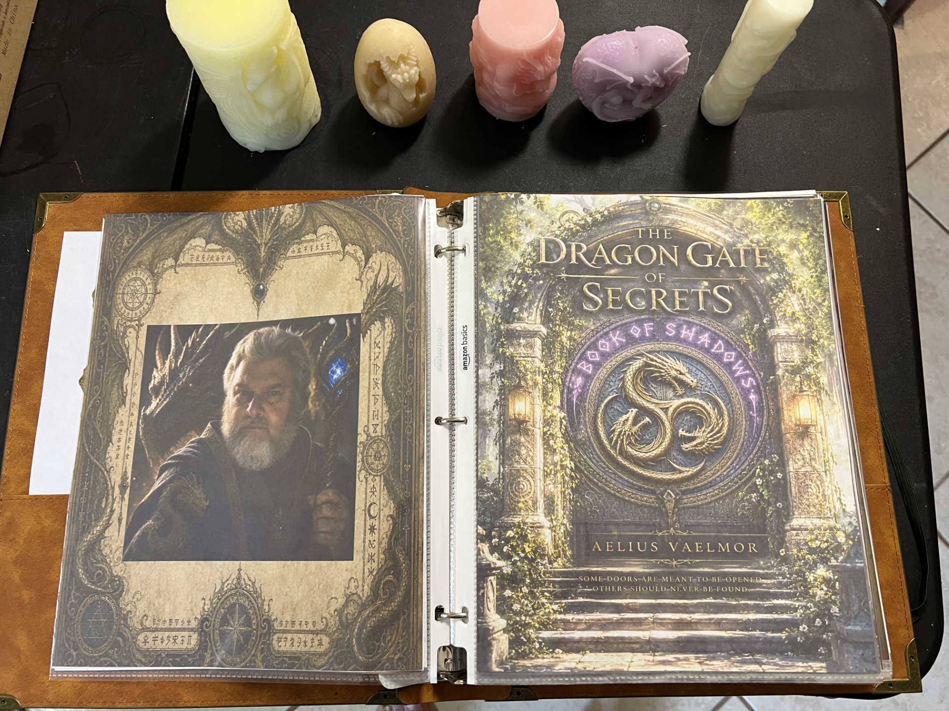 The Church of the First Day's completed books, cards, sewn bags, stones, and dragon candles arranged for display.